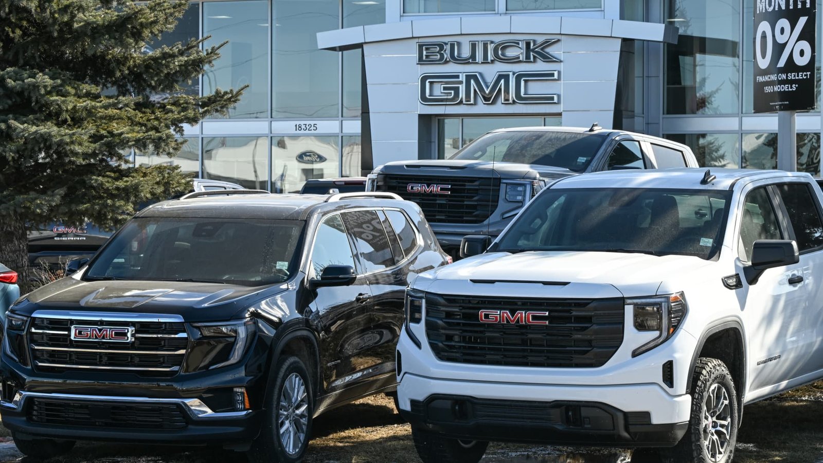 Stocks making the biggest moves premarket: GM, KO, MMM, PM