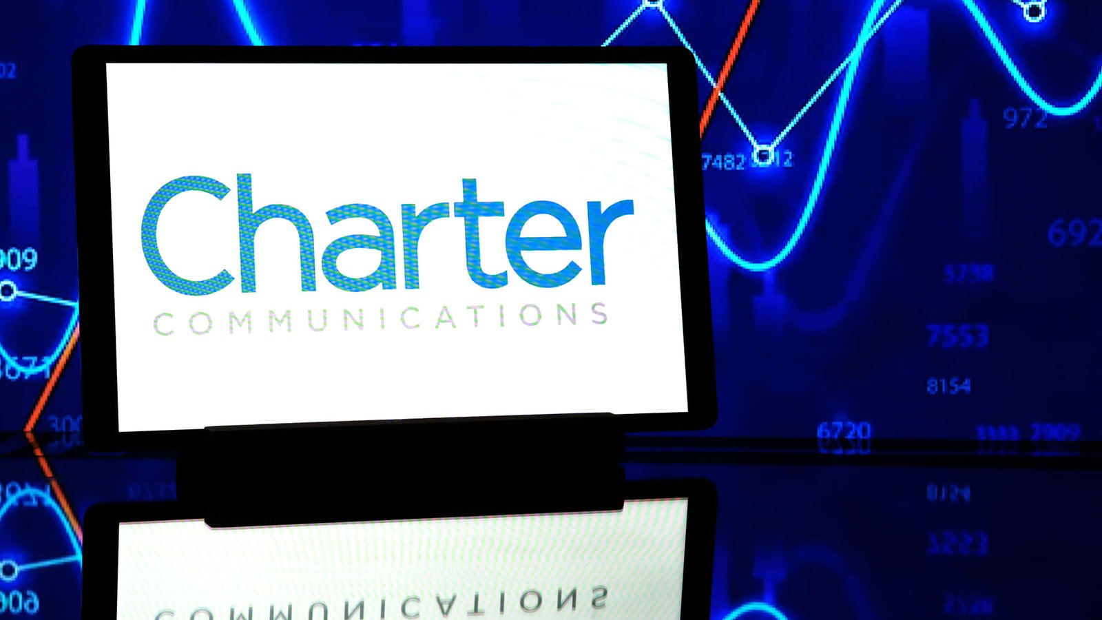 Stocks making the biggest moves premarket: CMCSA, SPCX, CHTR